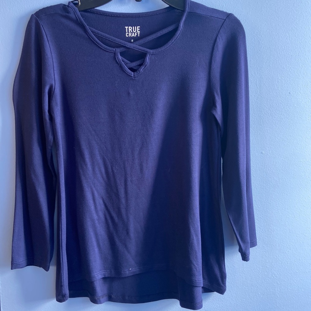 A navy blue long sleeve shirt